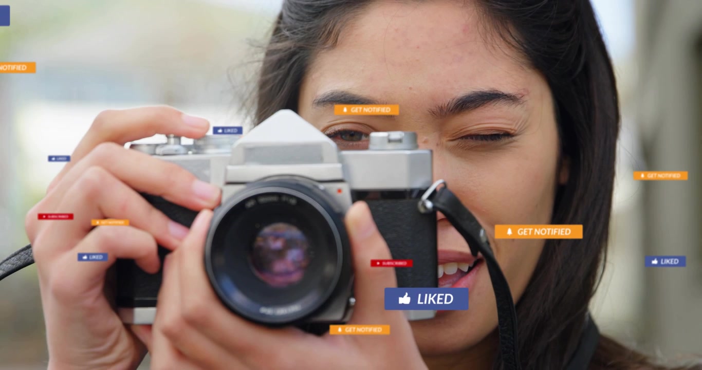 Vertical video: Woman creator seeing social UI over lens, lifting SLR and shooting for social use