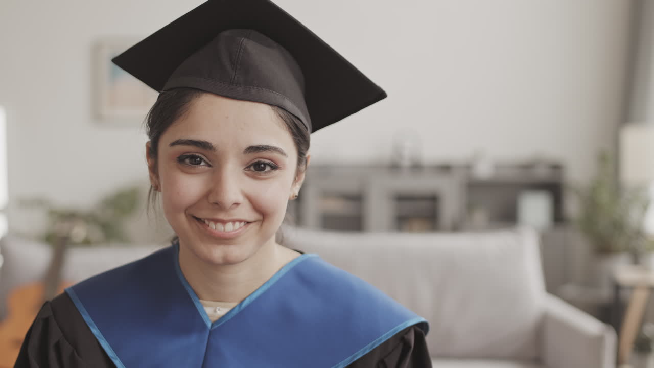Portrait of Cheerful Female Graduate