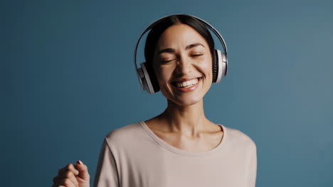 woman enjoying music with headphones