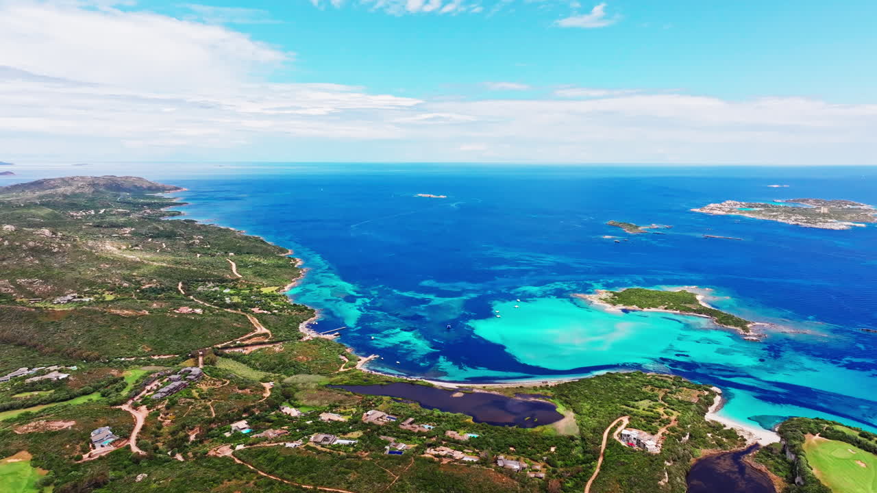 Aerial drone view of beautiful coastline of Corsica, France. High view of the colorful turquoise sea and the picturesque green landscape. Bird's eye view of the beaches. Summer holidays destination