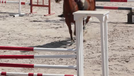 a horse fails to jump the hurdles at an equestrian horse jumping tournament, jump fail
