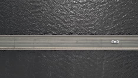 cars driving at valleymount bridge over poulaphouca reservoir in county wicklow, ireland