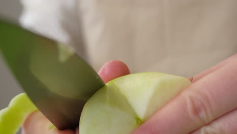 cutting a green apple