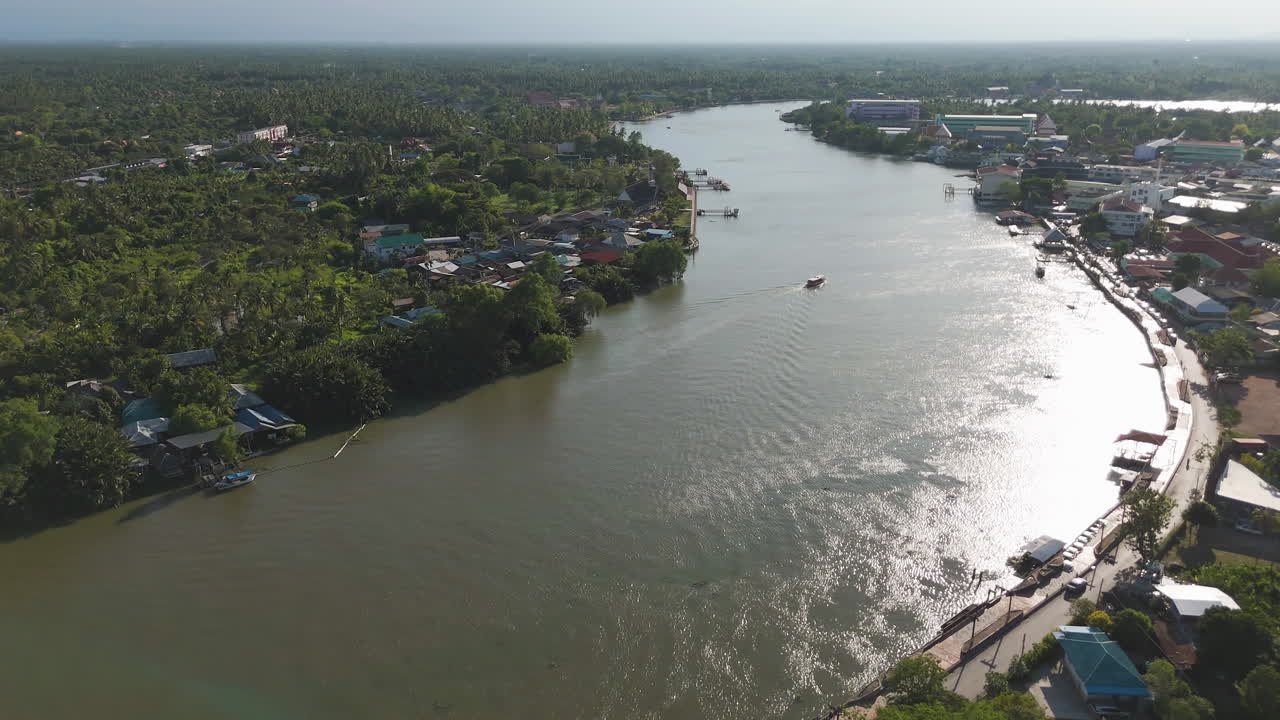 Coastal Town Along Mae Klong River During Sunset In Amphawa, Thailand. Aerial Drone Shot