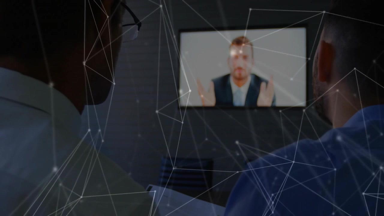 Remote host raising hands, starting data overlay as team reading reports during business meeting