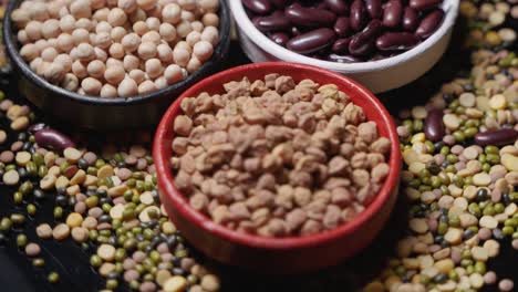 chickpeas, lentils and peas are placed in a bowl