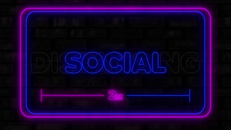 Social-distancing-neon-text-against-black-background