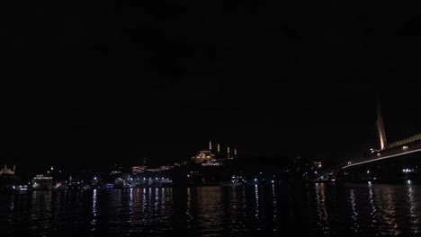 wide shot and night view of suleymaniye mosque and istanbul cityscape