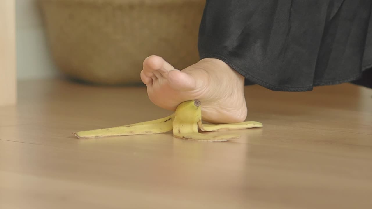 Person Slipping on Banana Peel