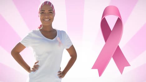 Animation-of-pink-breast-cancer-ribbon-logo-over-smiling-woman