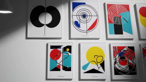 collection of abstract geometric art prints on display
