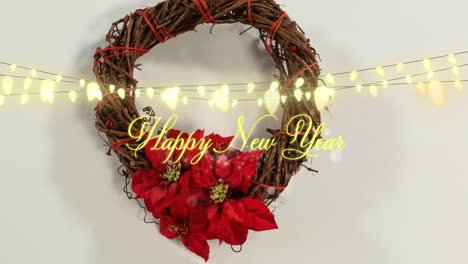 Animation-of-christmas-greetings-text-with-glowing-fairy-lights-and-christmas-decorations