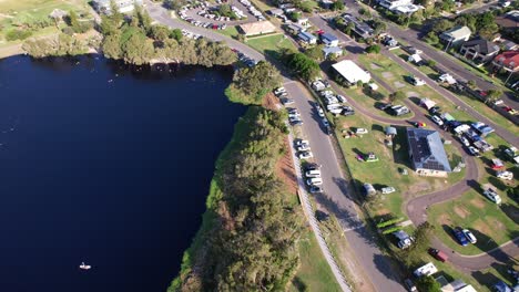 Aerial View Of Lake Ainsworth And Suburbs In Lennox Head, NSW, Australia - Drone Shot