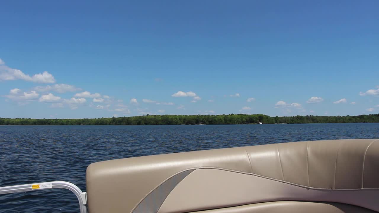 Boating On The Beautiful And Peaceful Kawartha Lakes In Ontario, Canada Under The Blue Sky. - wide rolling