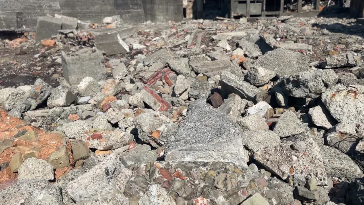 Detriti rocciosi sbriciolati Edificio abbandonato Isola di Hashima Giappone