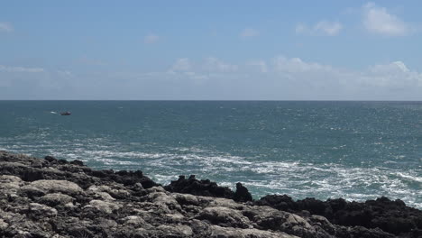 clean ocean and a rocky shore