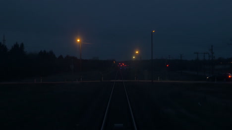 moving along the railroad at night