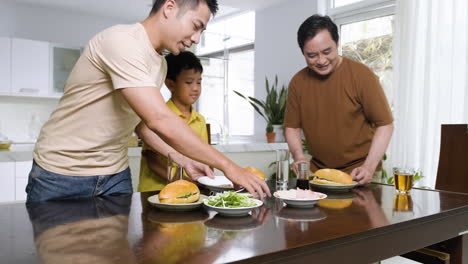 asian men and boy in the kitchen