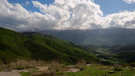Dramatic clouds over Albania&#039;s lush green mountains in a scenic timelapse