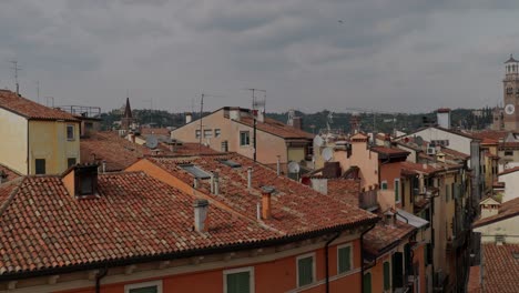 red brick roofscape in the historic town of verona, italy. aerial shot