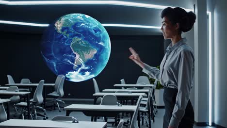 woman interacting with a holographic globe in a modern classroom