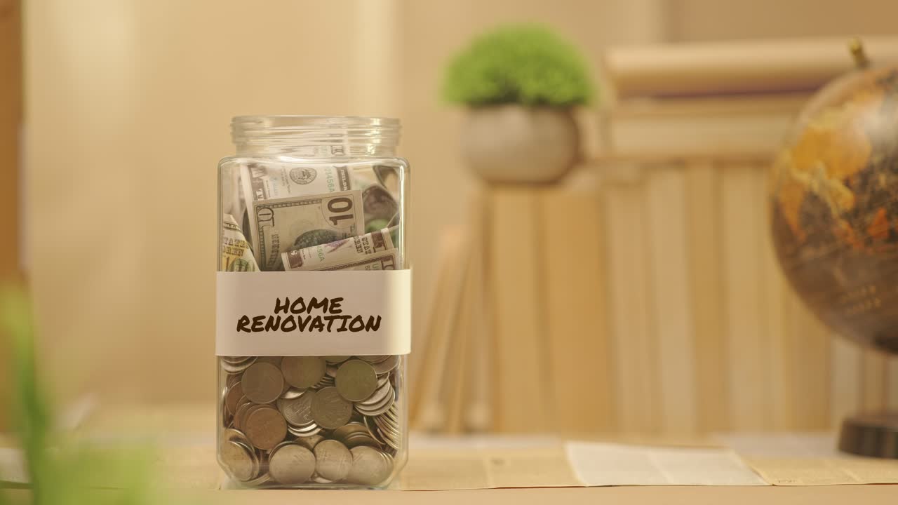 PERSON SAVING MONEY FOR HOME RENOVATION