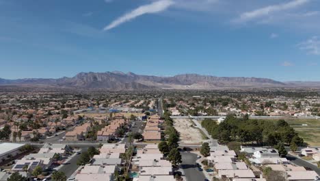 aerial view of houses in villages at summerlin with rocky mountain in background in las vegas valley of southern nevada, usa