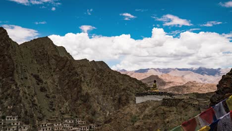 Buddha-overlooking-Hemis-Monastery,-shadow-and-light-in-Ladakh,-north-india,-said-to-be-the-place-Jesus-resided-during-the-lost-years