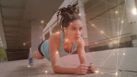 red de conexiones contra mujer afroamericana haciendo ejercicio de tabla en el parque