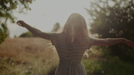 Happy-Attractive-Joyful-Woman-Hippie-Dancing-And-Walking-In-The-Sun-7