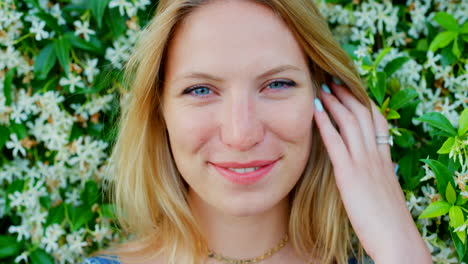 woman smiling in a garden