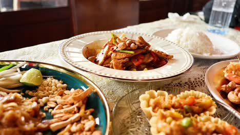 a variety of traditional thai dishes displayed