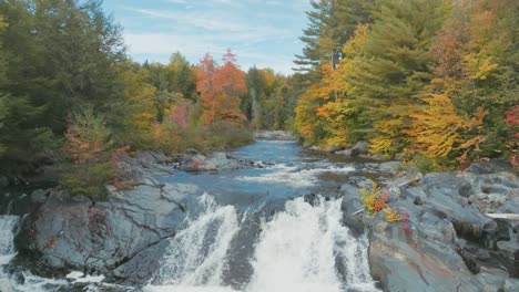 tobey falls on big wilson stream flanked by autumn colored foliage