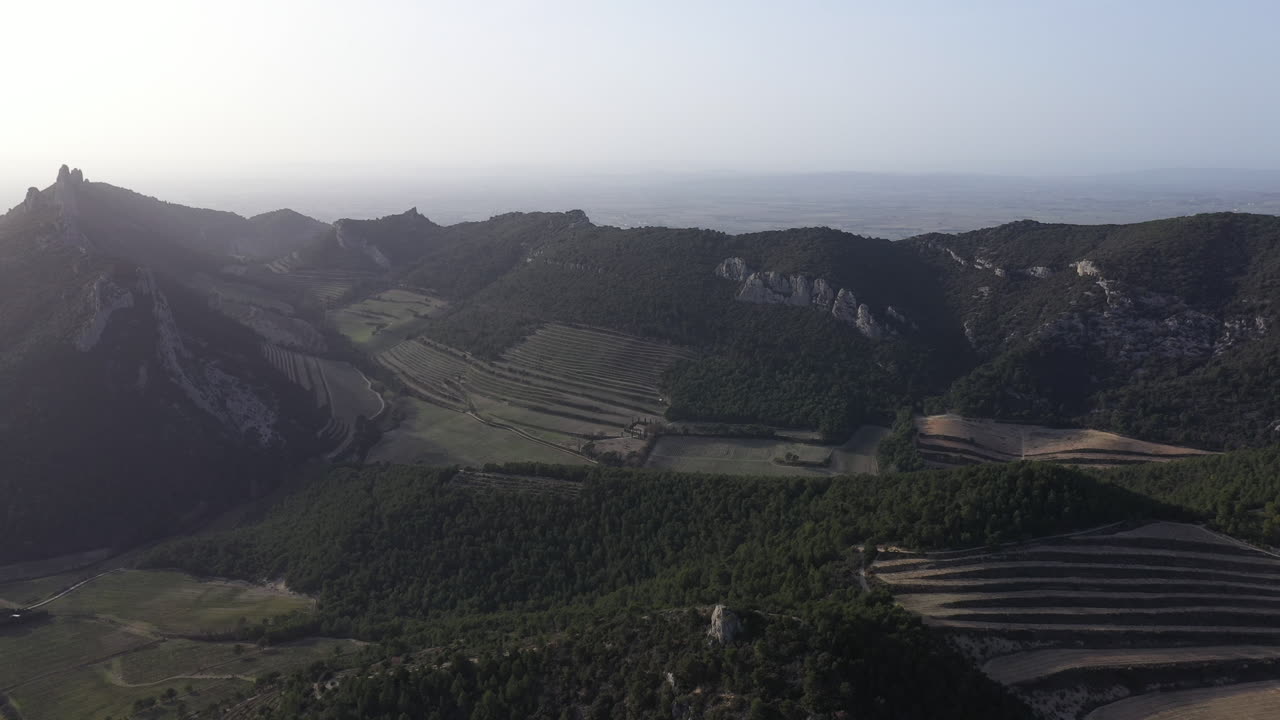 Sunset over the dentelles de Montmirail France Vaucluse vineyards fields aerial