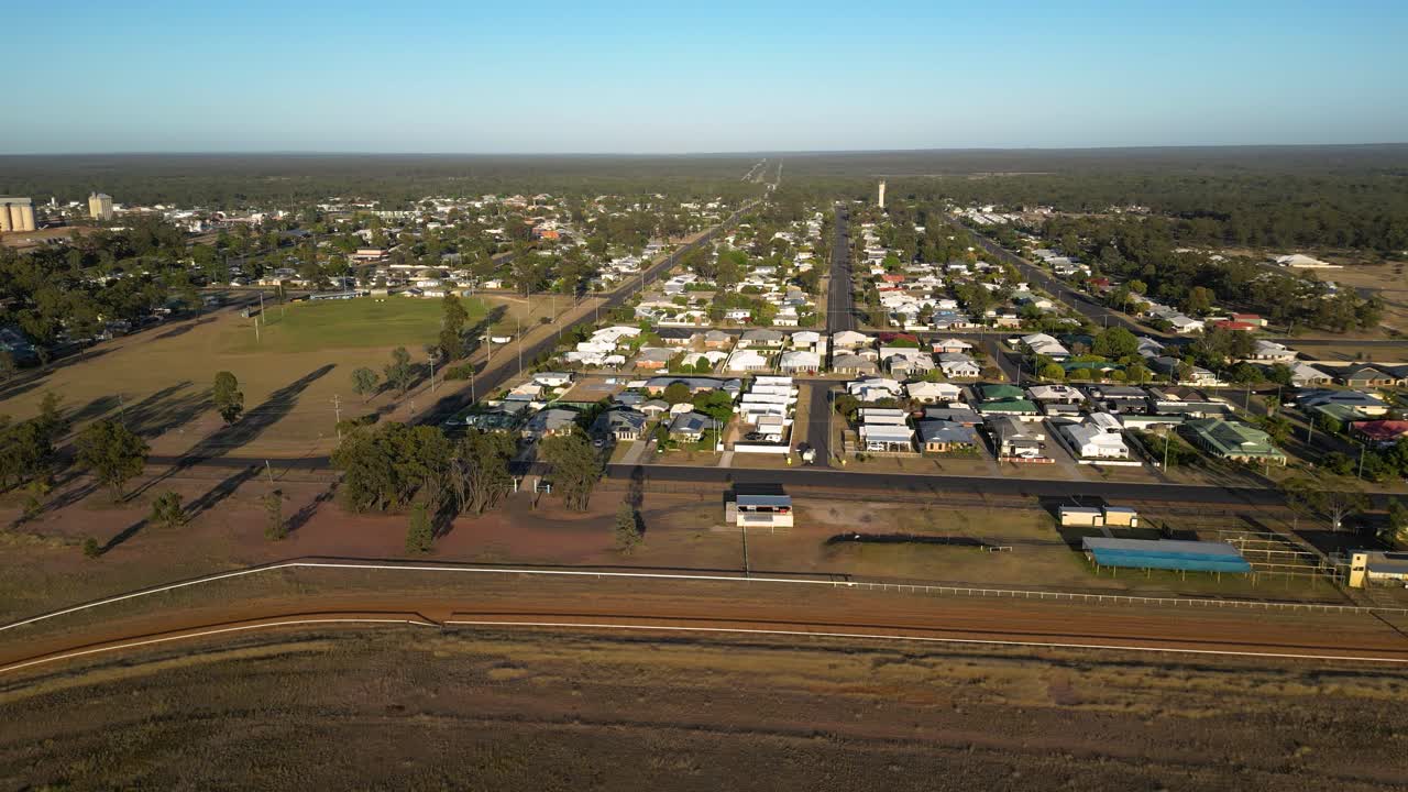 Right to left aerial views over residential housing in the small town of Miles Queensland.