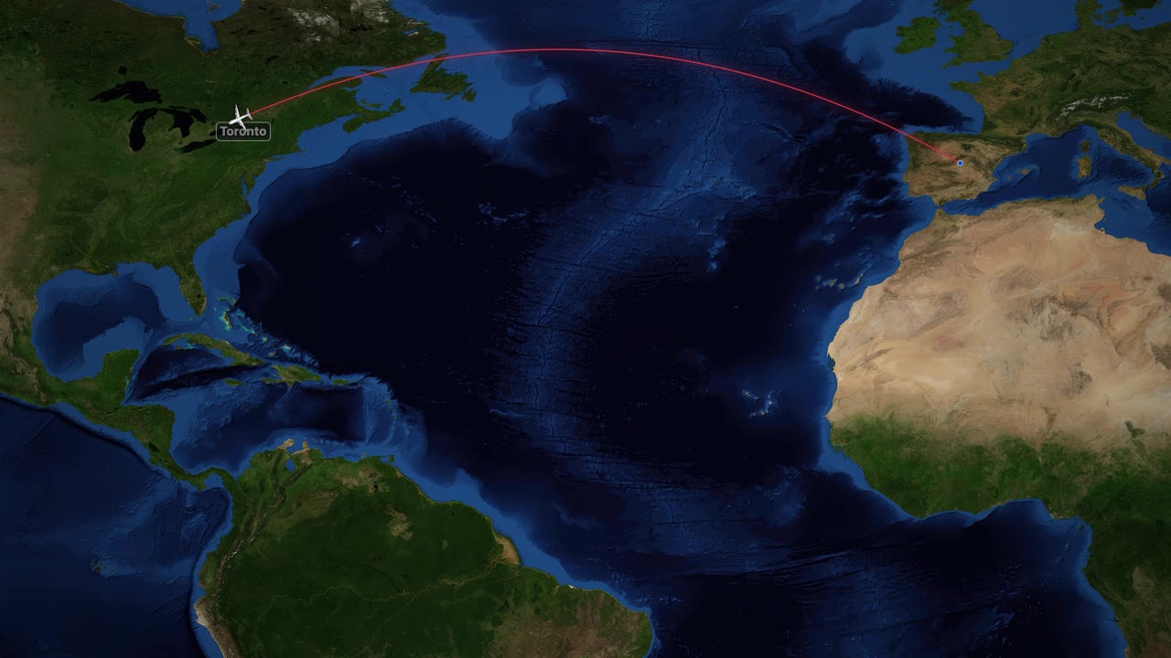 A digital world map tracks an airplane flying across the Atlantic Ocean from Europe