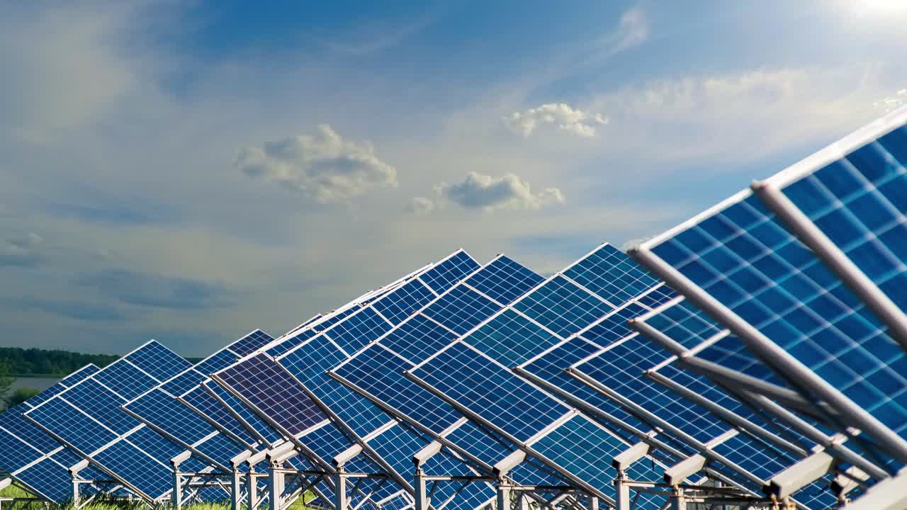 Solar Panel Timelapse, Clouds Moving. Time-lapse of moving clouds over solar photovoltaics panels