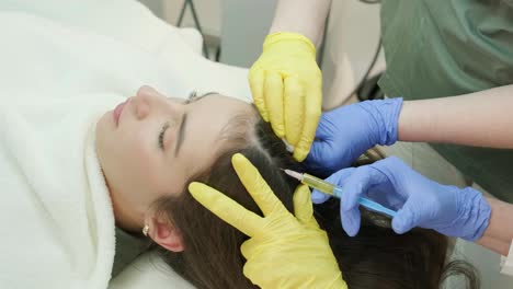 plasma therapy of the scalp. hair mesotherapy procedure in the modern cosmetology clinic