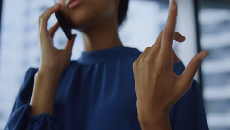 businesswoman having phone conversation. professional talking on smartphone