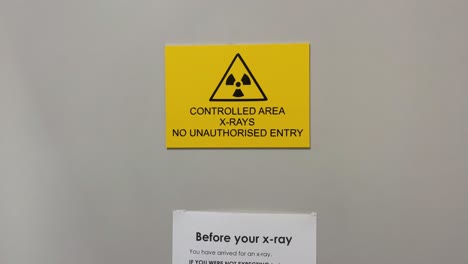 entry door and warning signs to x-ray room