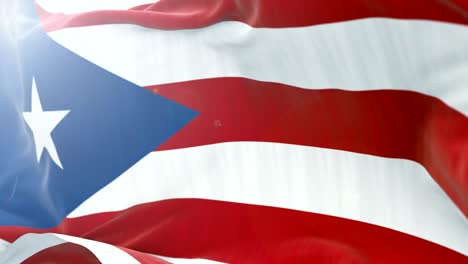 bandera de puerto rico fondo de agitaciones lentas. 4k agitaciones de banderas de primer plano. bucle sin costuras