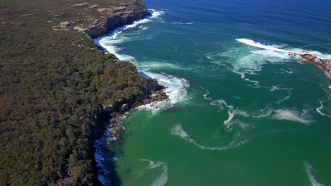 aerial view of providential point lookout to martin head at wattamolla beach in royal national park, sydney, nsw australia