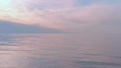 low shot over foggy scene of beautiful blue seascape, eastern europe