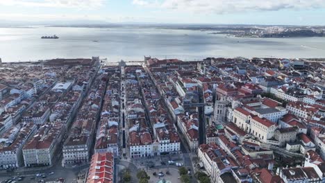 drone shot flying over central lisbon