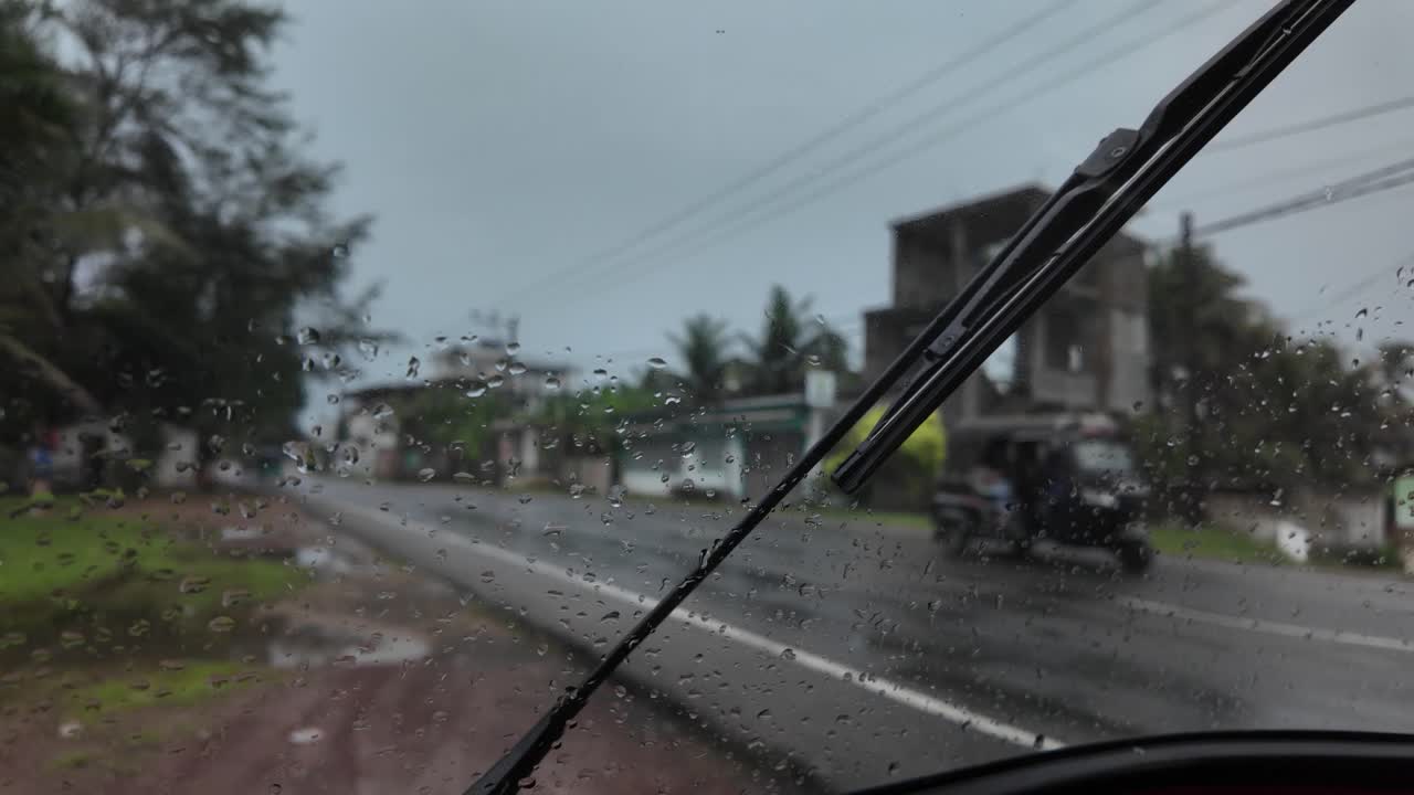 RIckshaw tuk tuk passing on Sri Lanka road low visibility blur transport