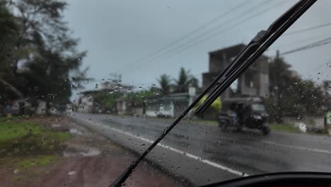 rickshaw tuk tuk passing on sri lanka road low visibility blur transport