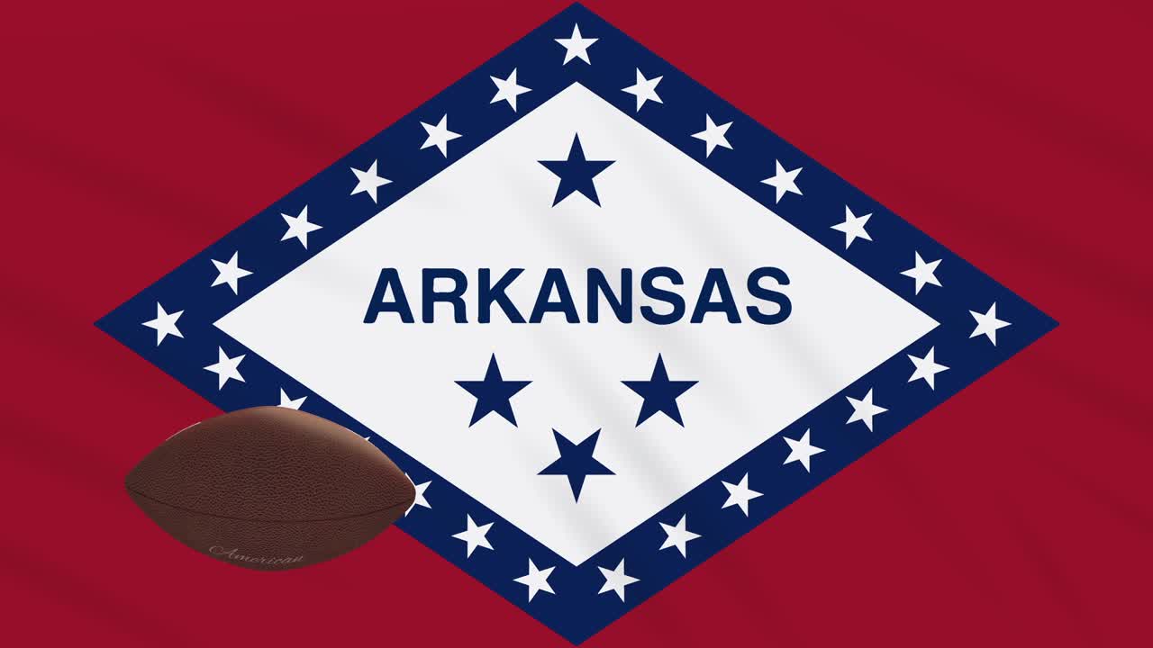 bandera de arkansas agitando y la pelota de fútbol americano gira, bucle