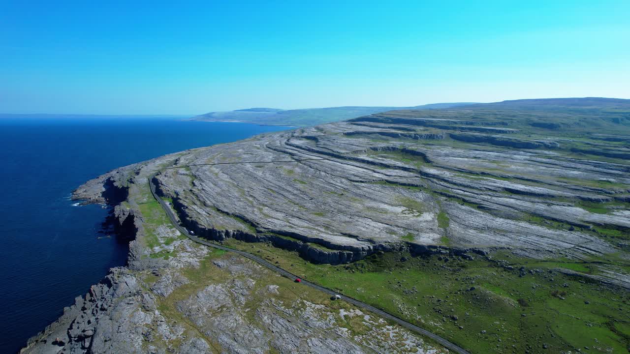 The Wild Atlantic Way Burren landscapes and coast road through rugged natural Ireland