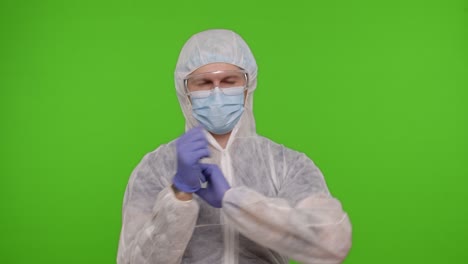 man in protective suit and face mask