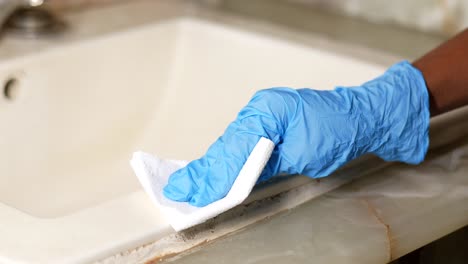 cleaning a bathroom sink